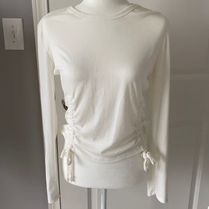 White long sleeve top with scrunch side bottoms